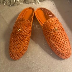 AERSOLES orange raffia mules.